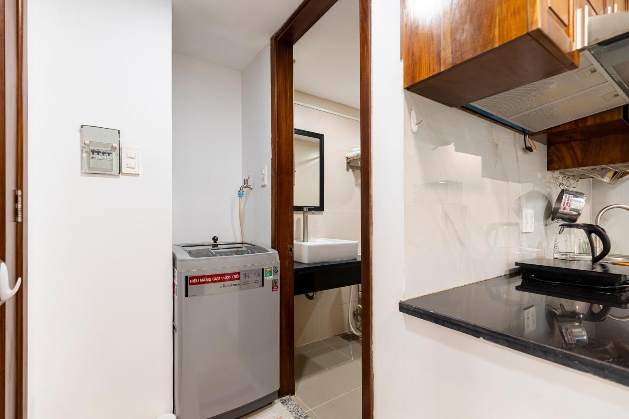 Homey Apartment Хошимин Екстериор снимка